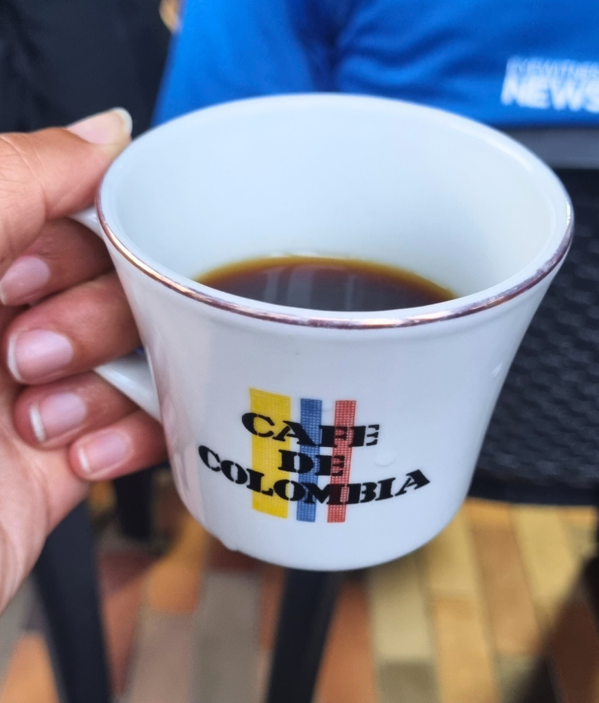 A freshly brewed cup of coffee made from beans harvested at Finca El Ocaso, served in a rustic ceramic mug.
