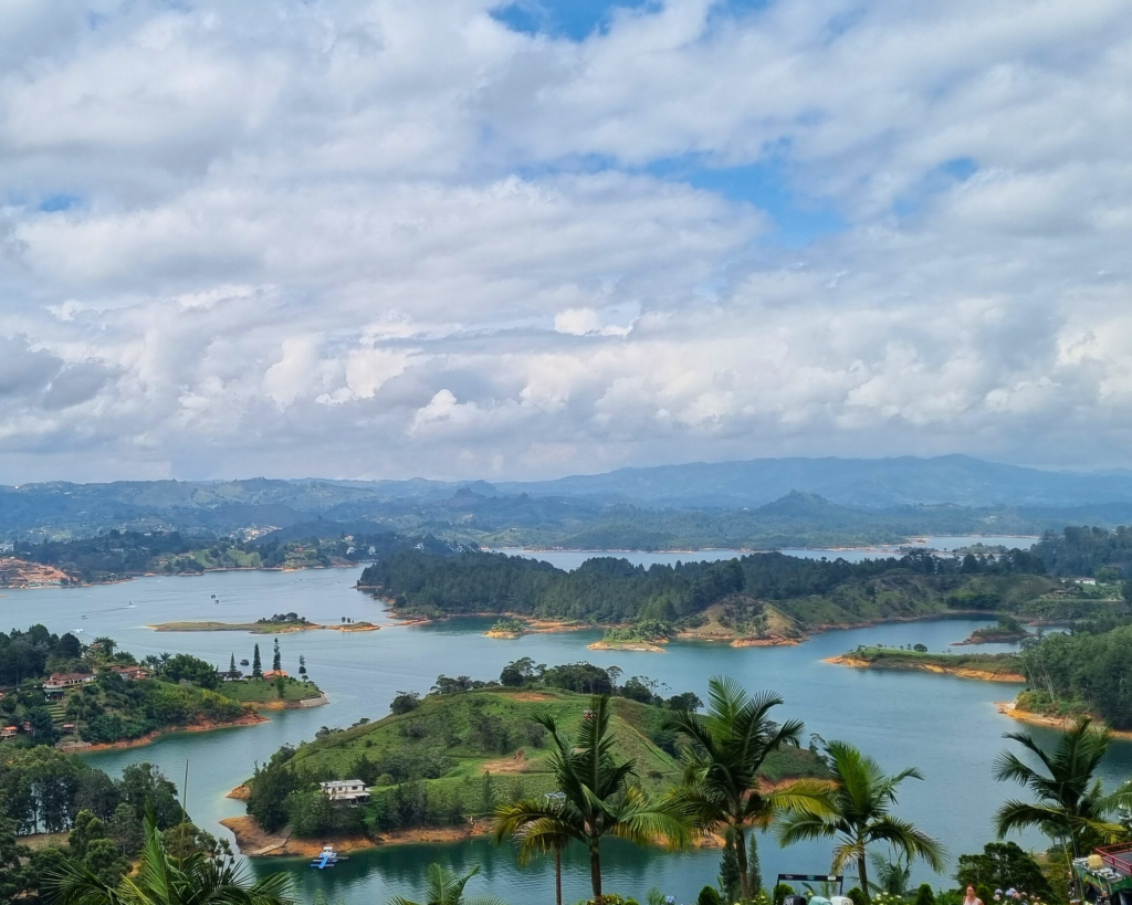 he top of Piedra del Peñol, overlooking the lush green landscape and crystal-clear waters of the Guatapé Reservoir.